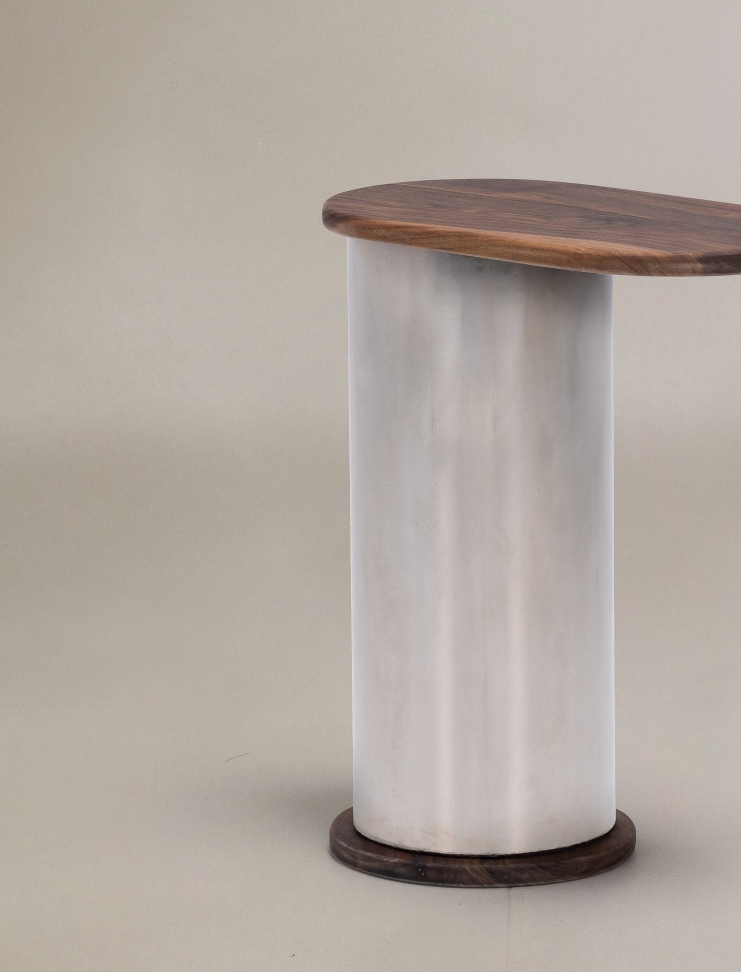 The SOMETHING ON THE SIDE side table in solid walnut