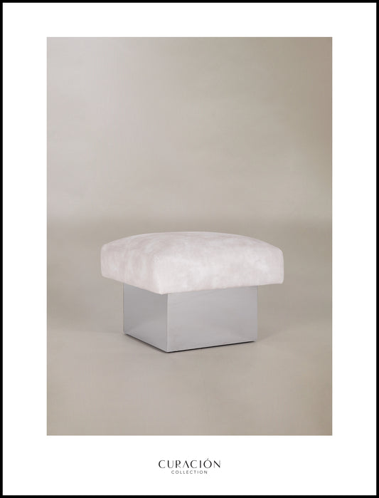 The CLIFTON IN BALANCE OTTOMAN in stainless steel